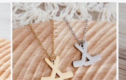 Engraved crossed hockey sticks necklace