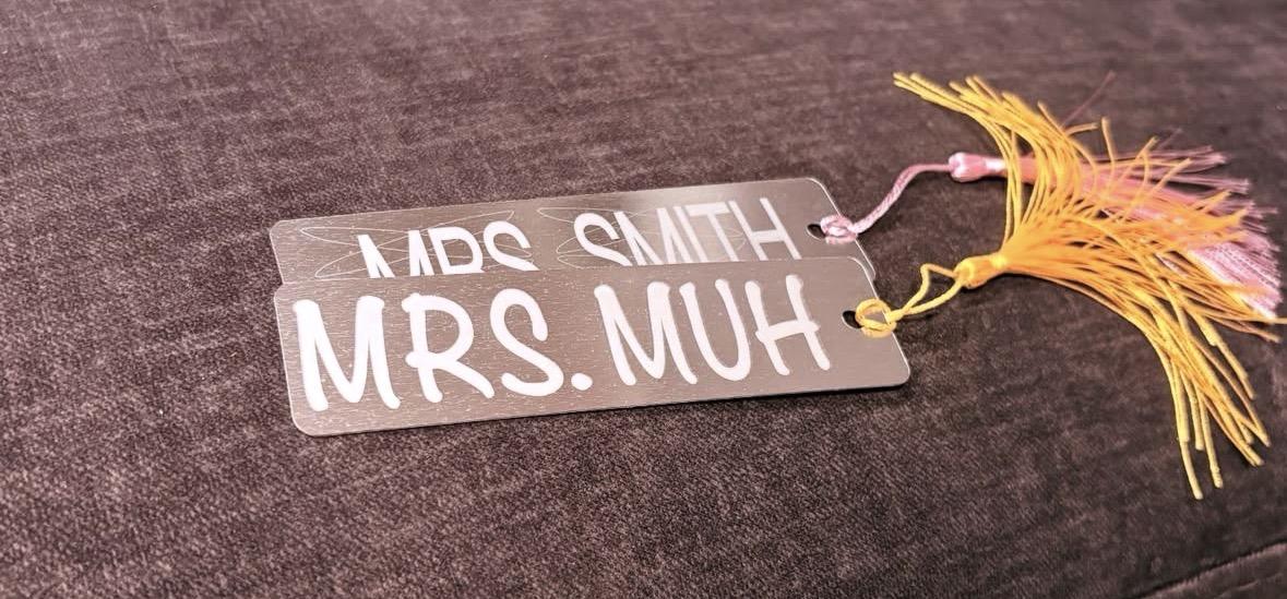 Engraved metal bookmarks with tassels