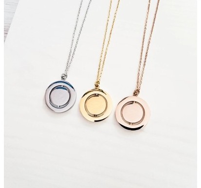 Engraved spinning disc necklace